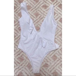 White v ruffle one piece size M NEW